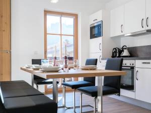 A kitchen or kitchenette at Apartment in Hollersbach near Ski Lift