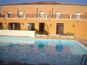 Bazén v ubytování Agathae Hotel & Residence nebo v jeho okolí