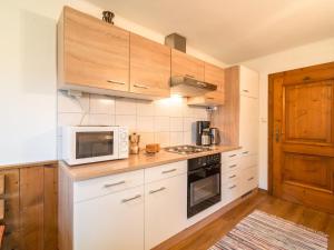 A kitchen or kitchenette at Holiday home in Bad St Leonhard in Carinthia