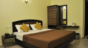 Postel nebo postele na pokoji v ubytování Hotel Priso