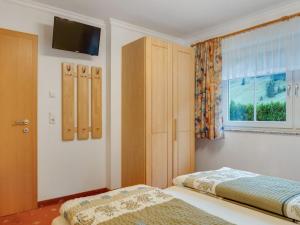 Postel nebo postele na pokoji v ubytování Apartment in Kleinarl near Ski Amadé