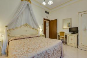 Posteľ alebo postele v izbe v ubytovaní Hotel Marte