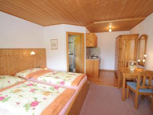 Posteľ alebo postele v izbe v ubytovaní Splendid Apartment in Schladming with Sauna + 32 fotografií