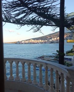 a view of the water from a balcony at Apartments Romario in Sarandë