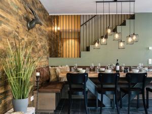 a restaurant with a long table and chairs at Luxury Chalet in Leogang near Ski Area in Leogang