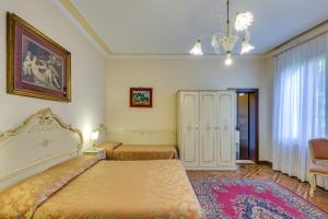 Posteľ alebo postele v izbe v ubytovaní Hotel Marte