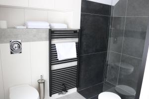 Koupelna v ubytování Auberge de Poteaupré