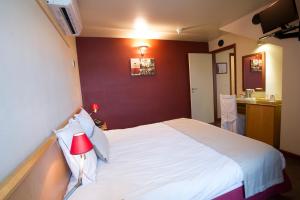 Postel nebo postele na pokoji v ubytování Auberge de Poteaupré