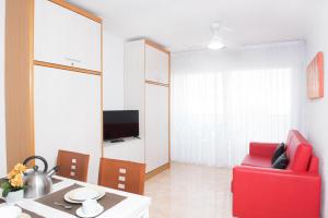 TV a/nebo společenská místnost v ubytování Apartaments Costa d'Or