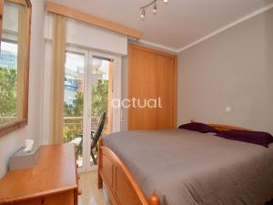 Postel nebo postele na pokoji v ubytování Santa Marina 13