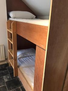 a couple of bunk beds in a room at Finn McCools Giants Causeway Hostel in Bushmills