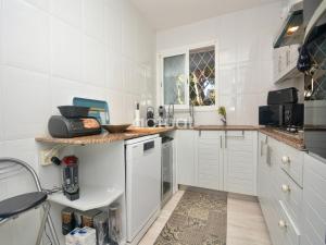 Køkken eller tekøkken på Voramar Vii Bajos A