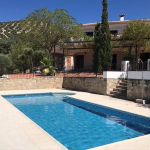 The swimming pool at or close to Cortijo Rocas Altas