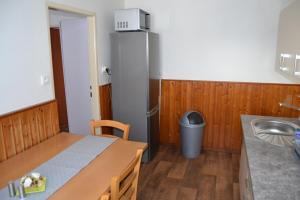 O bucătărie sau chicinetă la Apartmán Pod Říčkami