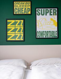 Ліжко або ліжка в номері SLEEEP HOTEL Ansfelden