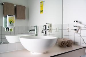 Ванна кімната в SLEEEP HOTEL Ansfelden