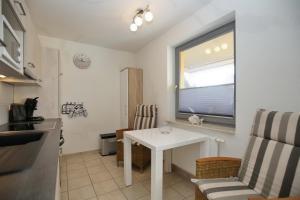 Küche/Küchenzeile in der Unterkunft Hanse-Haus Wohnung 04