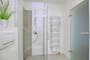 Ein Badezimmer in der Unterkunft Hanse-Haus Wohnung 04