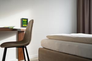 Ліжко або ліжка в номері SLEEEP HOTEL Ansfelden