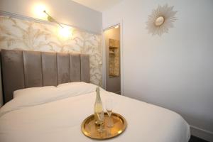 Postel nebo postele na pokoji v ubytování Le Lac d'Or - Duke Housing
