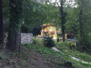 a house in the middle of a forest at Вила Ренесанс Костенец in Kostenets +108 photos