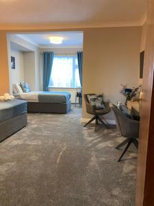 Area soggiorno di Glasha Meadows Accommodation