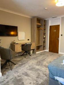 TV o dispositivi per l'intrattenimento presso Glasha Meadows Accommodation