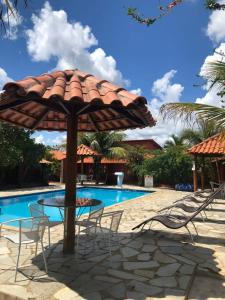 The swimming pool at or close to Pousada Encanto dos Anjos