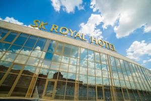 a building with a sign on top of it at SK Royal Hotel Tula in Tula