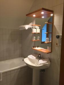 Koupelna v ubytování Auberge de Poteaupré