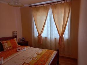 Letto o letti in una camera di Apartmani Sobe Sljivancanin