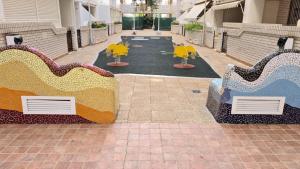 Posezení v ubytování Acogedor apartamento 2ª Línea playa