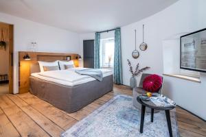 Postel nebo postele na pokoji v ubytování Apart Hotel Wasserturm
