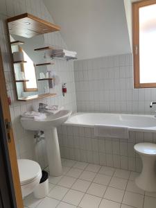 Koupelna v ubytování Auberge de Poteaupré