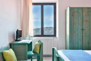 Postel nebo postele na pokoji v ubytování S'Enis Monte Maccione + 37 fotografií