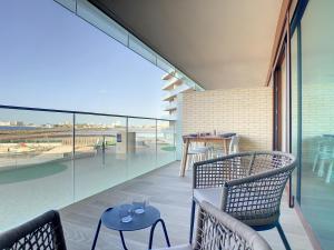 A balcony or terrace at Los Flamencos Vista Playa - 6109