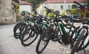 a row of bikes parked on a street at Agri BERTORELLA in Cuneo