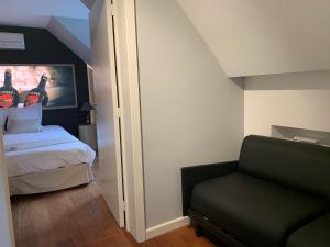 Postel nebo postele na pokoji v ubytování Auberge de Poteaupré