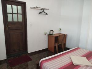 Postel nebo postele na pokoji v ubytování Villa Rodrigo