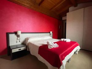 Postel nebo postele na pokoji v ubytování Il Belvedere Guest House