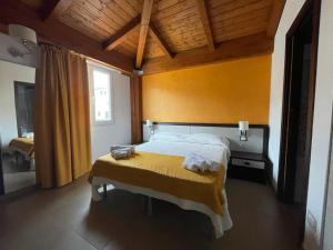 Postel nebo postele na pokoji v ubytování Il Belvedere Guest House