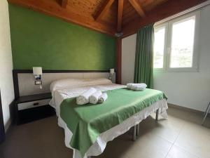 Postel nebo postele na pokoji v ubytování Il Belvedere Guest House
