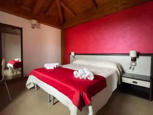 Postel nebo postele na pokoji v ubytování Il Belvedere Guest House