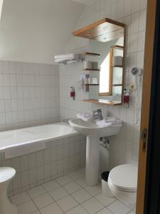 Koupelna v ubytování Auberge de Poteaupré