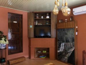 Телевизия и/или развлекателен център в Casa do Volfrâmio
