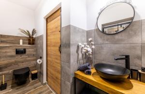 Koupelna v ubytování Apartamenty 73
