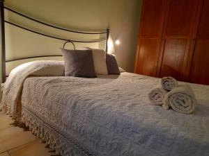 Tempat tidur dalam kamar di Casa Giampiero