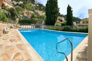 Bazén v ubytování French Riviera - 3 pièces, vue mer et piscine nebo v jeho okolí + 47 fotografií