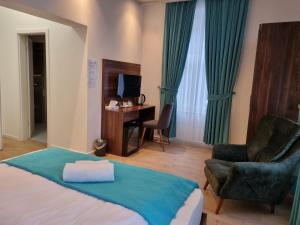 Postel nebo postele na pokoji v ubytování A&F Hotel Chemnitz