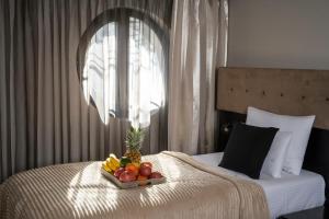 Postel nebo postele na pokoji v ubytování Akacija Luxury Suites
